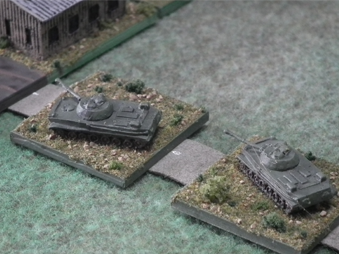 PT-76s approach town